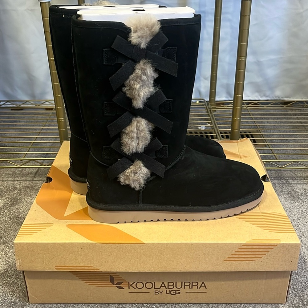 Brand new in the box Ugg boots with fur lining